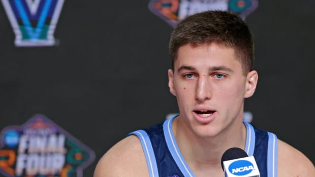 Villanova Wildcats guard Collin Gillespie (2) talks to media during a press conference before the 2022 NCAA men's basketball tournament Final Four semifinals at Caesars Superdome.